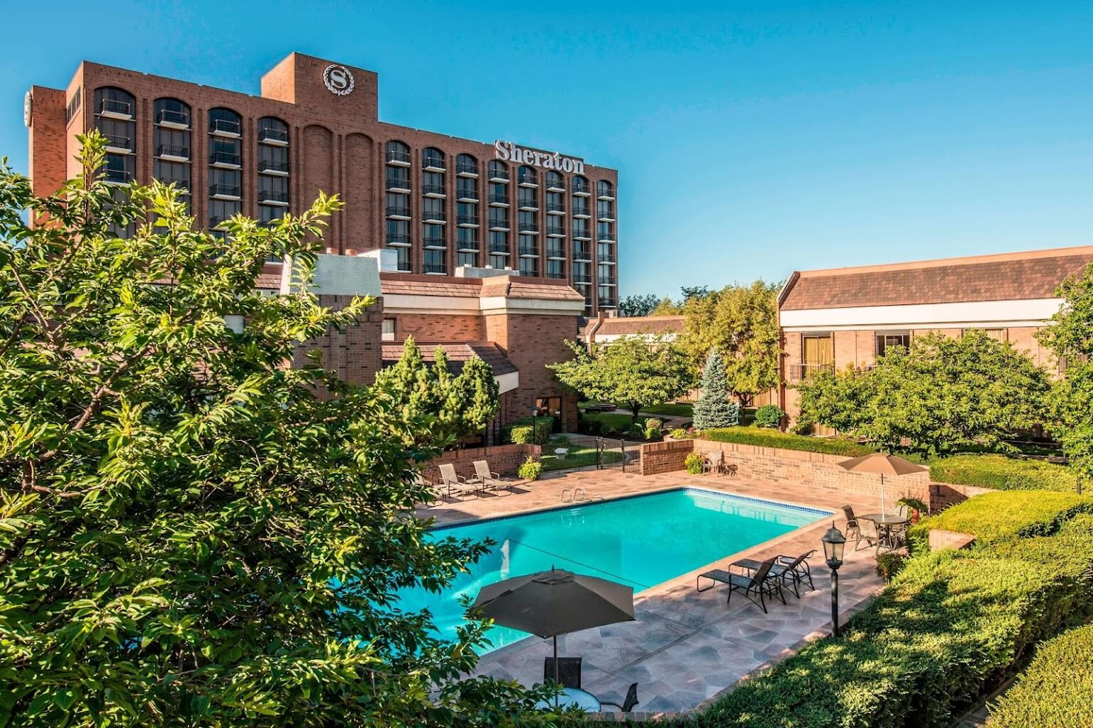 Sheraton Salt Lake City Hotel building with pool