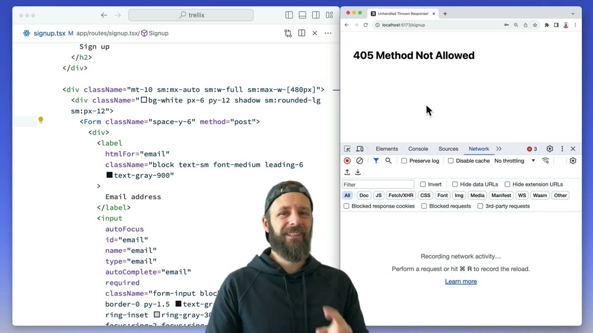 Ryan in front of some code